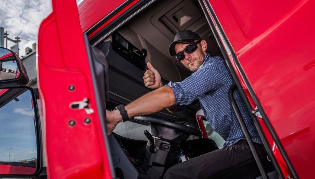 driver in a red straight truck